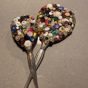 Antique mirror and brush with old buttons glued on